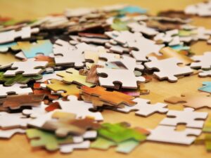 Puzzle pieces on a table.