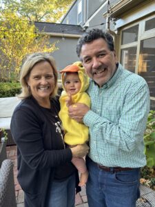 Rob and Becky with a grandchild.